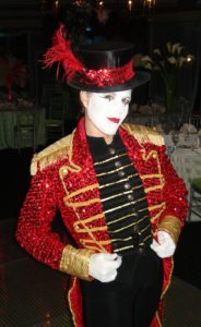 Penny England as Circus Ringleader Mime