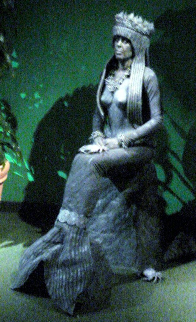 Penny England as Living Mermaid Statue