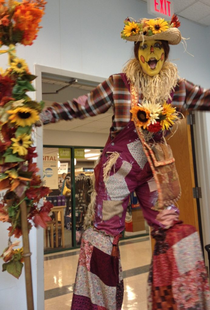 Penny England as a Scarecrow on Stilts