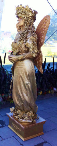 Penny England as the Golden Fairy with Wings Side View